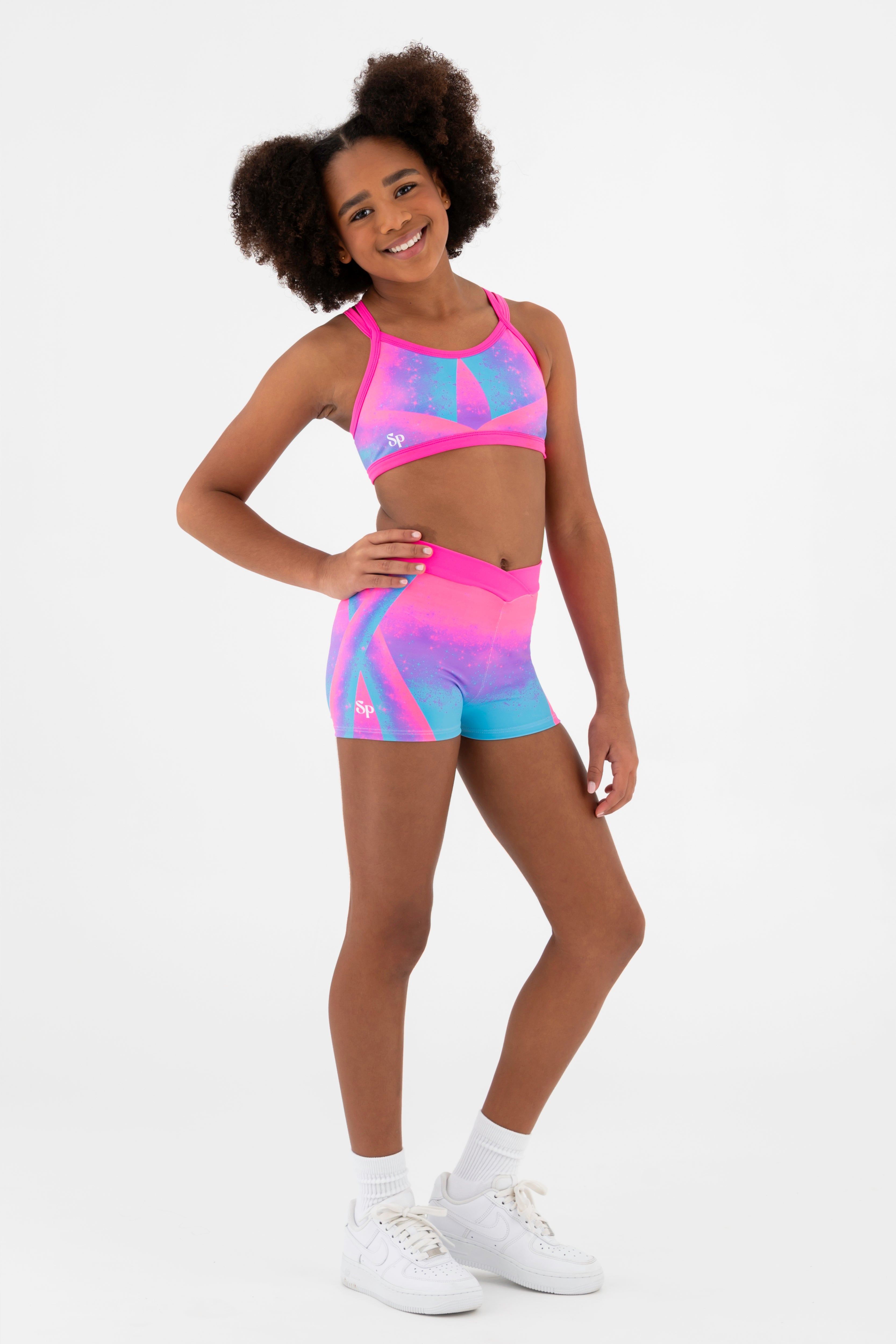 Sylvia P Cindy Rainbow Gymnastics Short In Rainbow Print, Crossover Mid-Rise Waistband, Front Detail View.